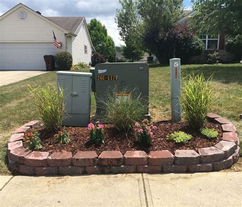 how to hide an electrical box outside|how to hide utility boxes.